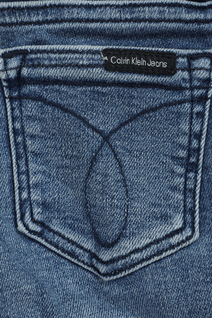 גילאי 4-16 מכנסי סקיני ג'ינס כחולים עם שפשופים CALVIN KLEIN