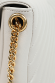 תמונת פנים של תיק קייט מעור מרופד בגוון לבן