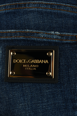מכנסי סקיני ג'ינס כחולים עם תגית מטאלית DOLCE & GABBANA