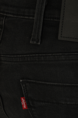מכנסי ג'ינס 519 אקסטרים סקיני בשטיפה שחורה LEVI`S