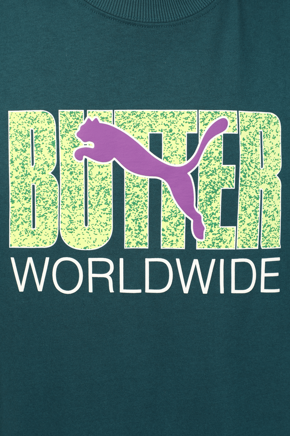 תמונה אחורית של פומה X באטר גודס חולצת לוגו בצבע כחול