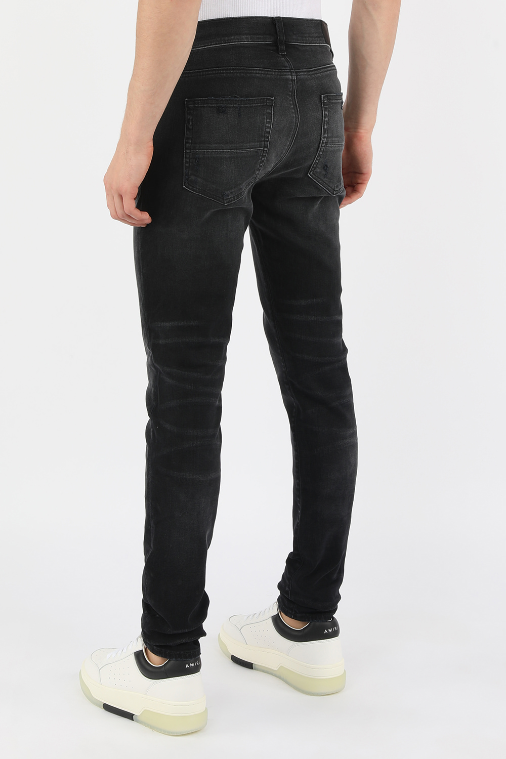 מכנסי ג'ינס סקיני קלאסיים בגוון שחור AMIRI