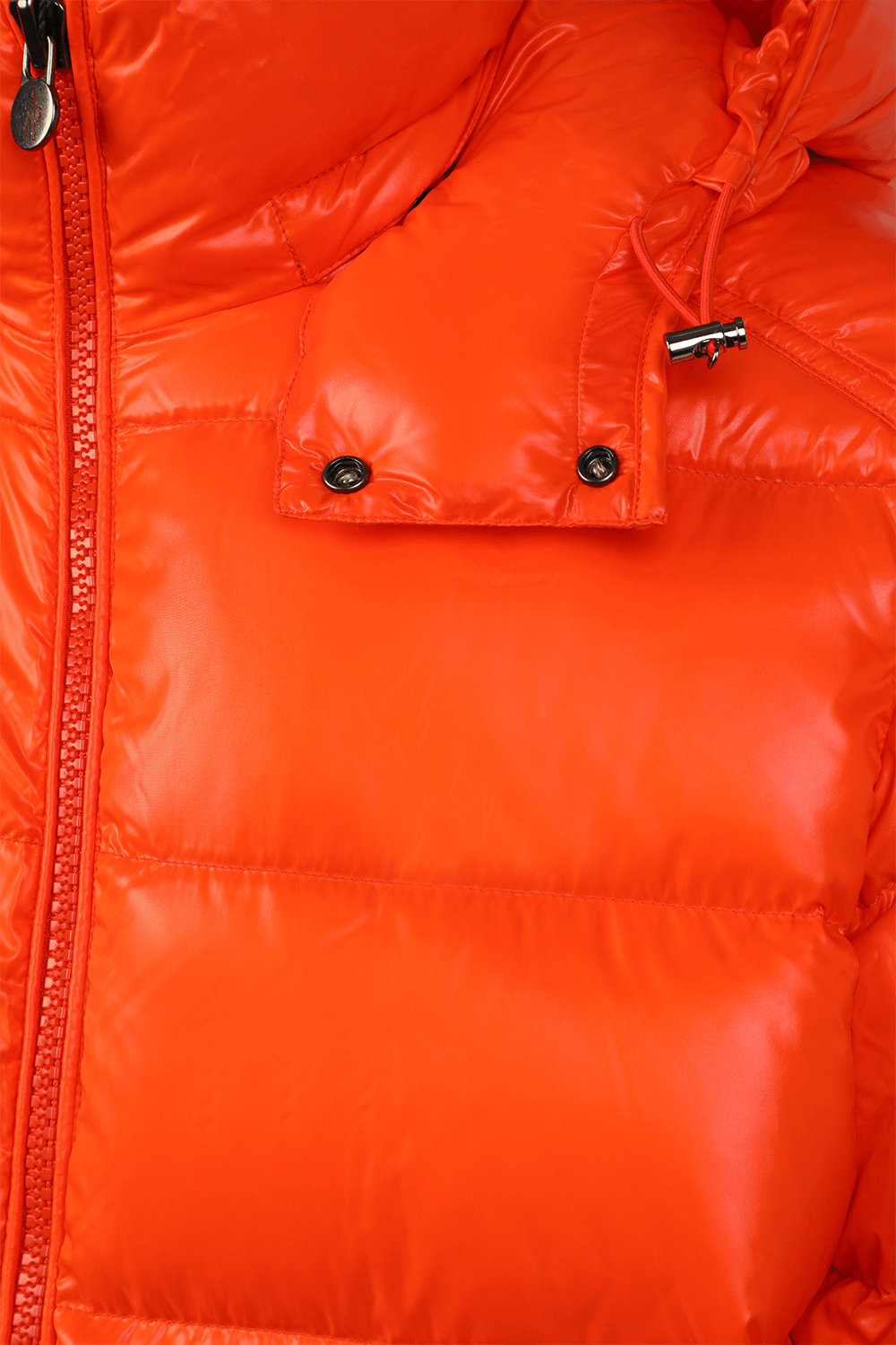 תמונה אחורית של מעיל מאיה פאפר עם סגירת רוכסן בגוון כתום מבירק