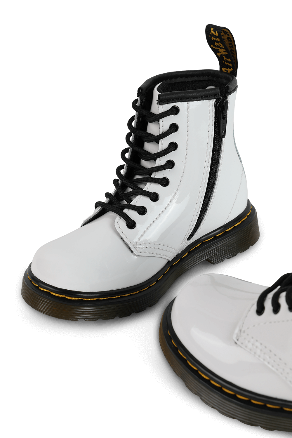 תמונת תקריב של מידות 22-27 מגפי עור קלאסיות בצבע לבן מבריק