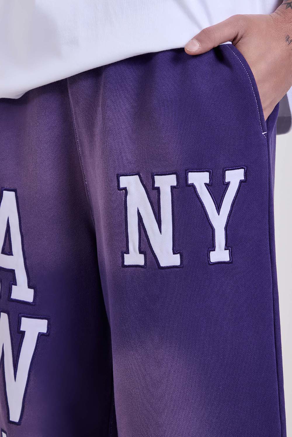 תמונת תקריב דוגמן של מכנסי ג'וגר בגזרה משוחררת