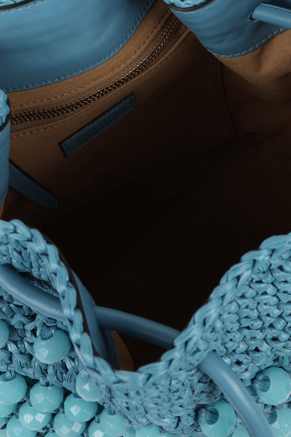 תמונת פנים של תיק נשיאה סרוג עם חרוזים בגוון תכלת