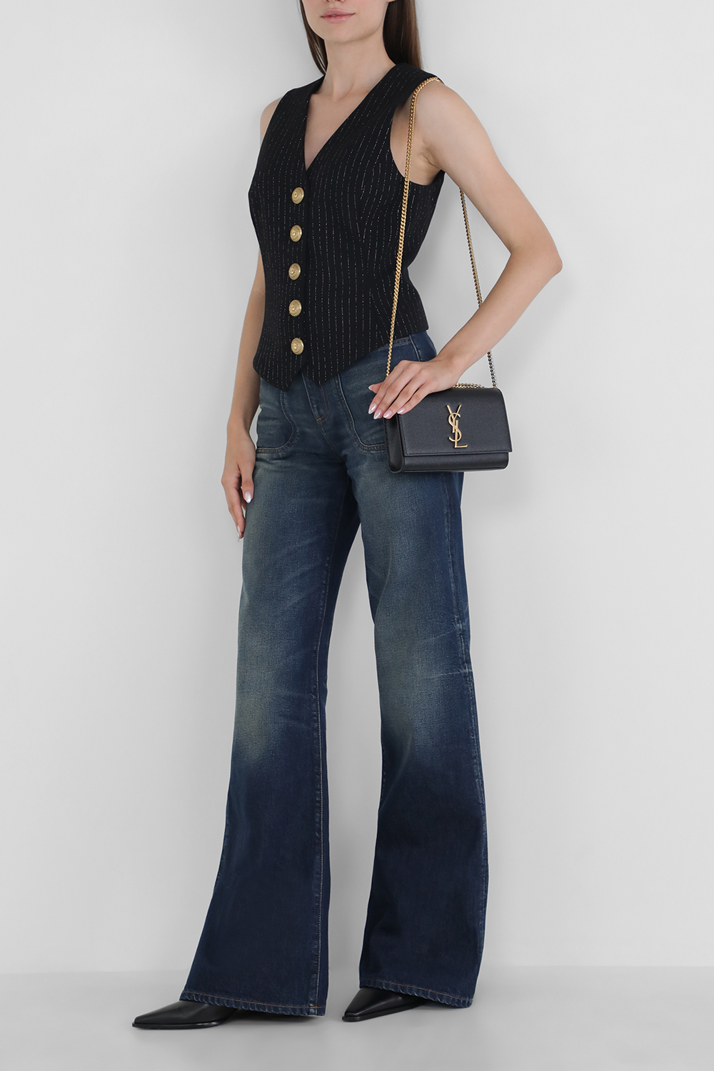 תמונת דוגמן קידמית של תיק קייט מעור מגורען בגודל סמול