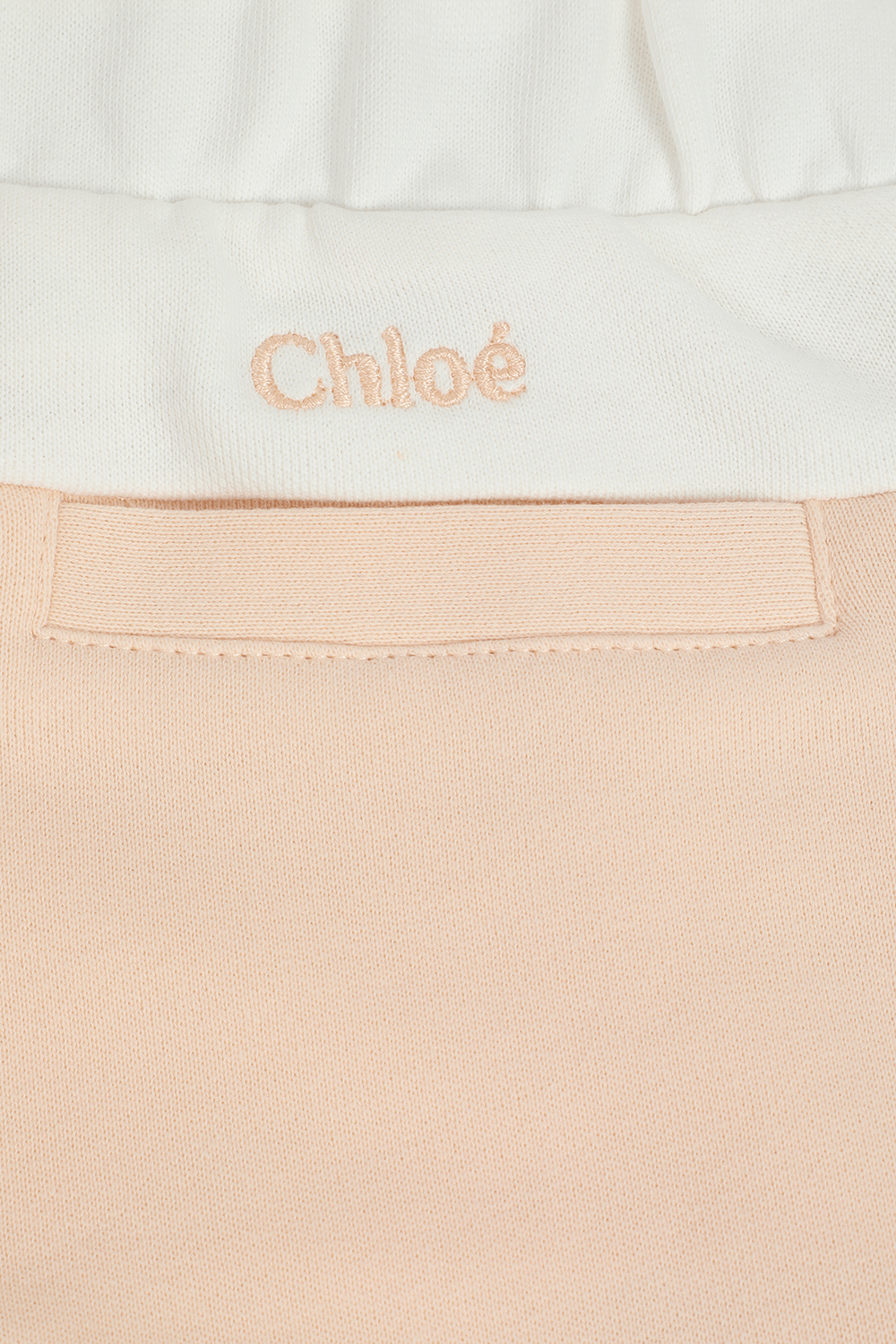 תמונה אחורית של גילאי 2-5 מכנסיים ורודים עם שרוכים לבנים