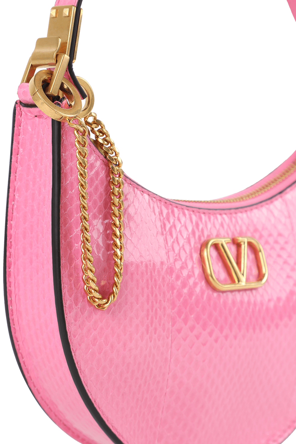 תמונת פנים של תיק ורוד מבריק בצללית ירח