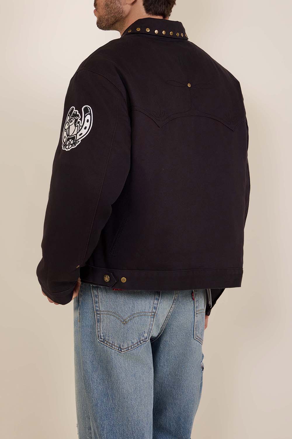 תמונת דוגמן אחורית של ליוויס X צעצוע של סיפור ז'קט ג'ינס