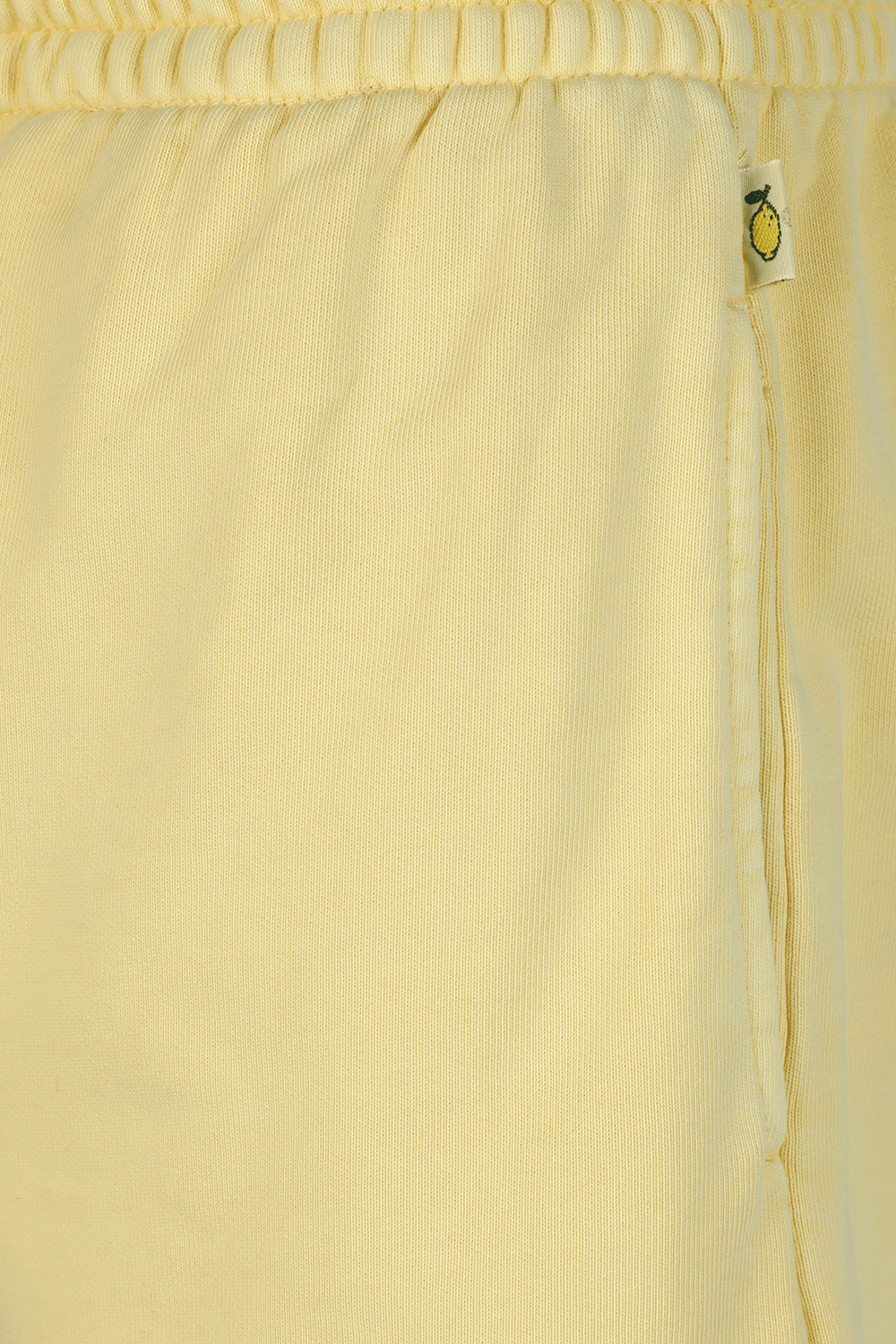 תמונה אחורית של מכנסי ג'וג קצרים בצהוב בננה