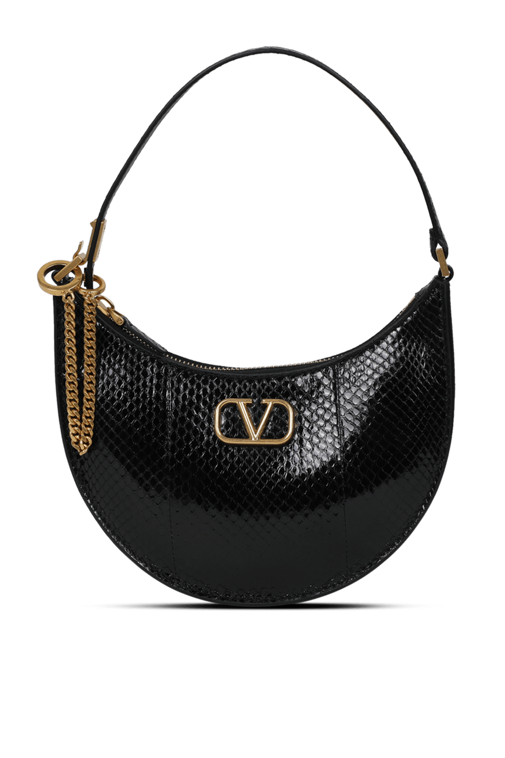 תמונה קידמית של תיק שחור מבריק בצללית ירח