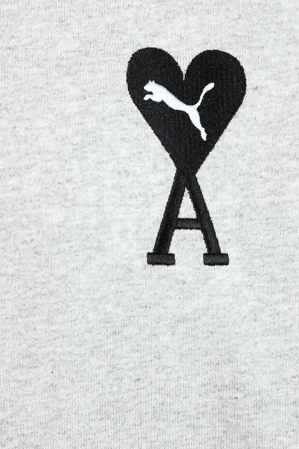 תמונה אחורית של פומה X אמי חולצת טי אפורה