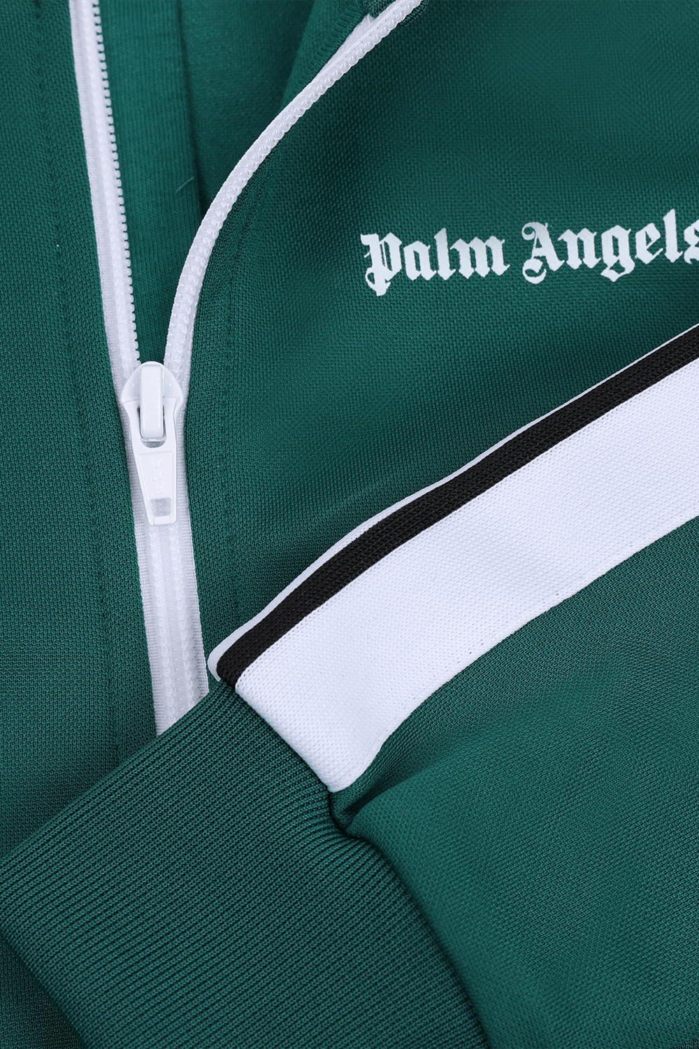 תמונה אחורית של גיל 12 ז'קט מרוכסן עם לוגו