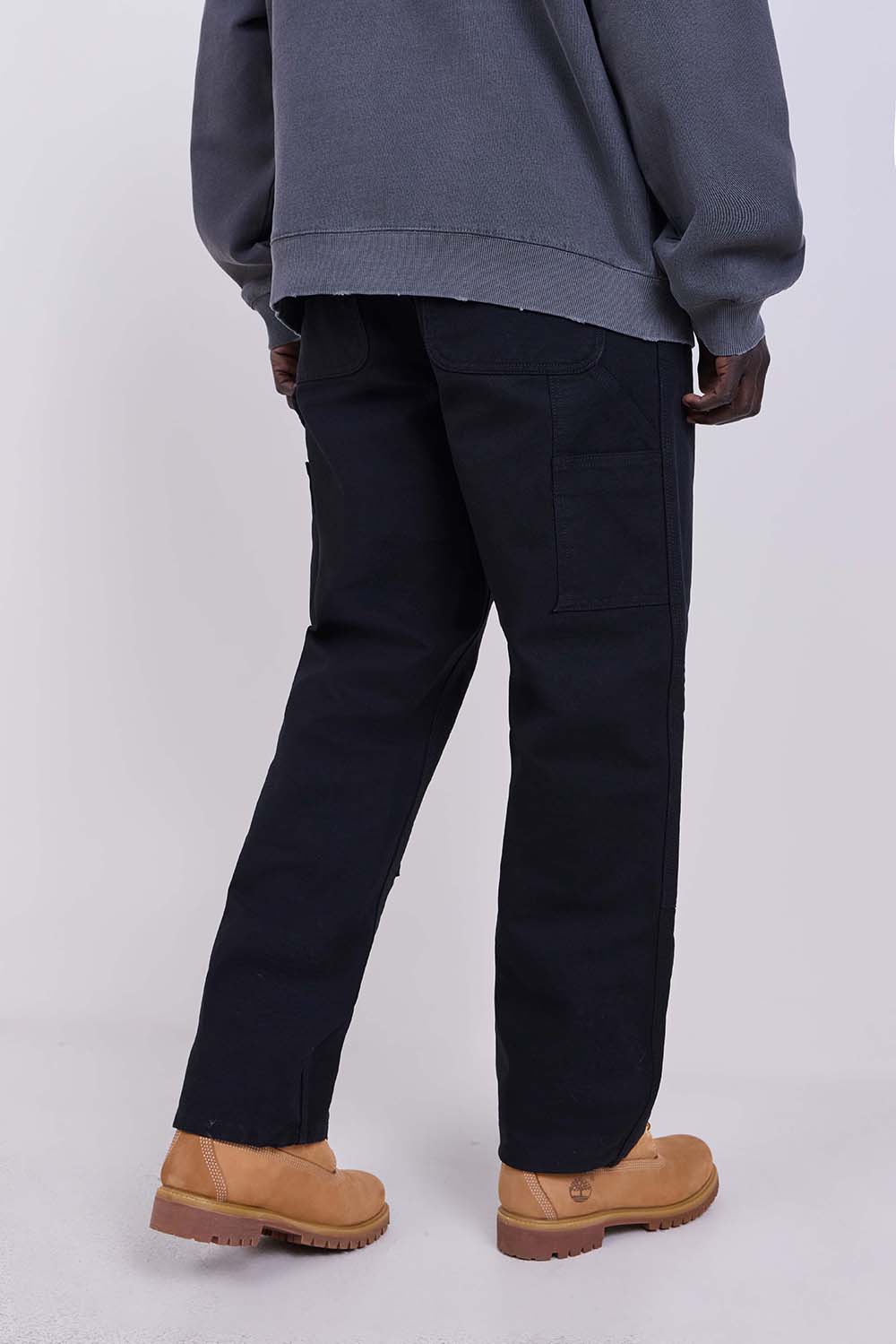 תמונת דוגמן אחורית של מכנסי ג'ינס דאבל ניי