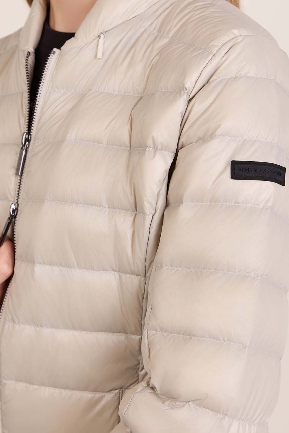 תמונת תקריב דוגמן של מעיל פוך