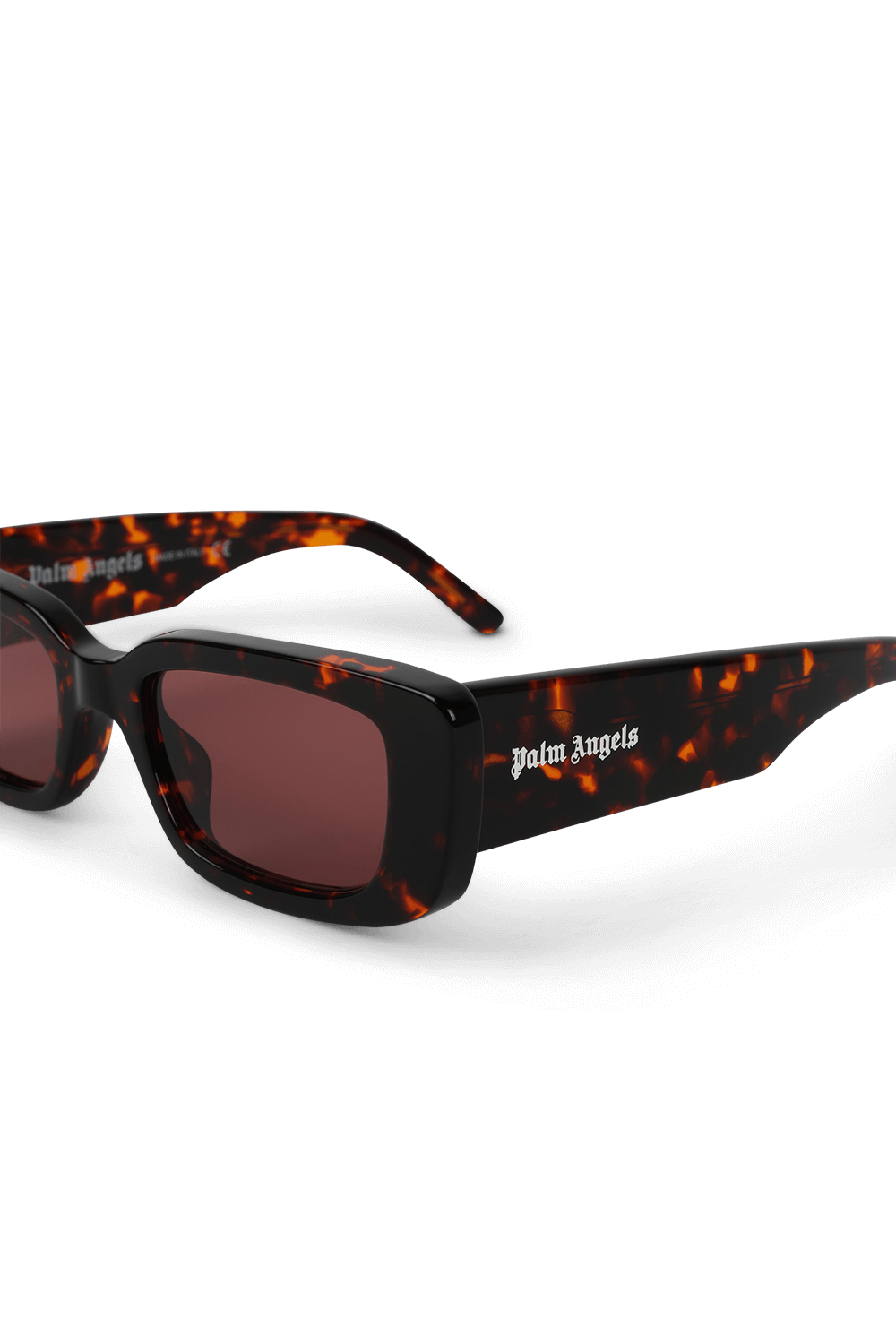 תמונת תקריב של משקפי שמש ג'ורג'ינה בגוון חום כהה מנומר