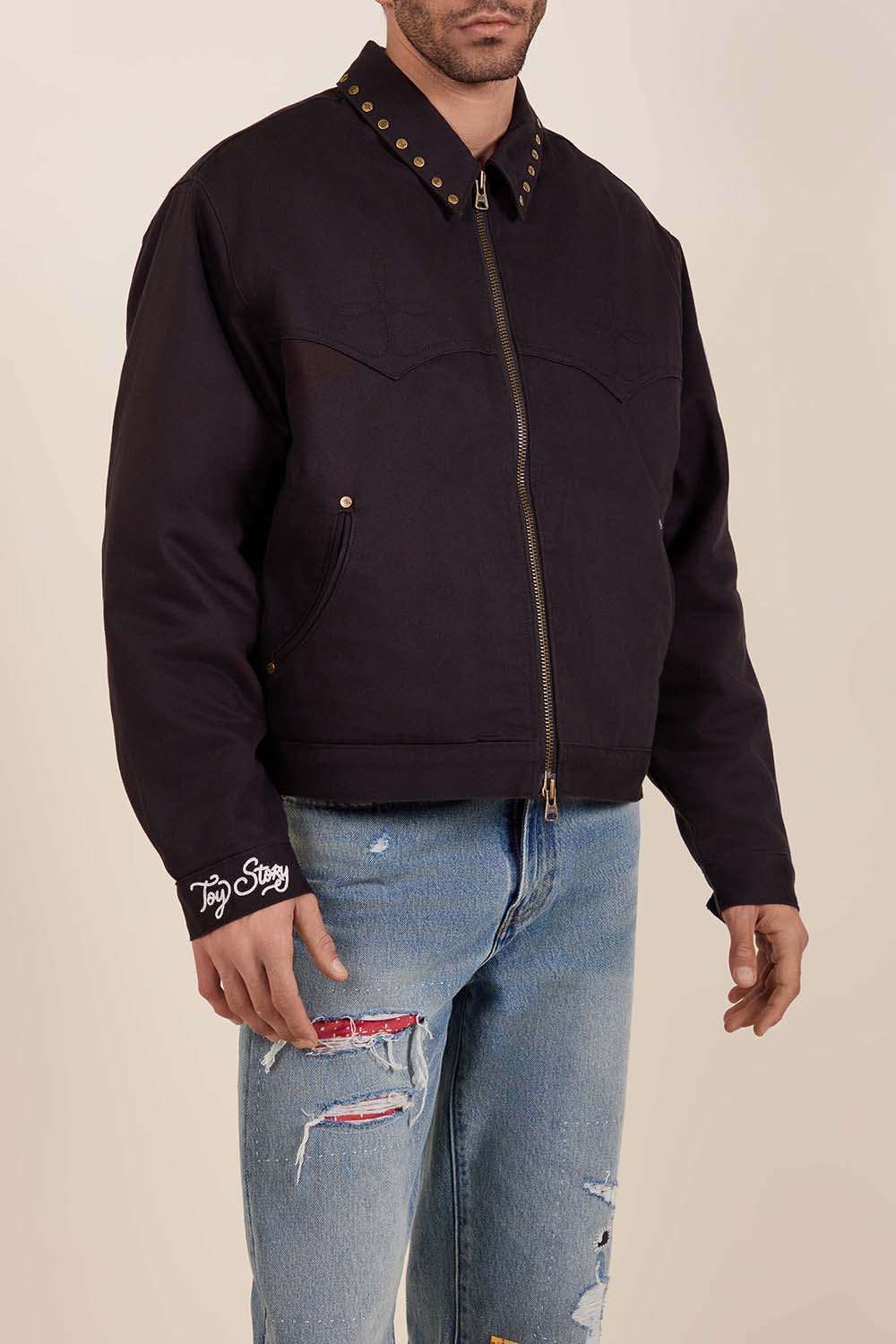 תמונת דוגמן קידמית של ליוויס X צעצוע של סיפור ז'קט ג'ינס