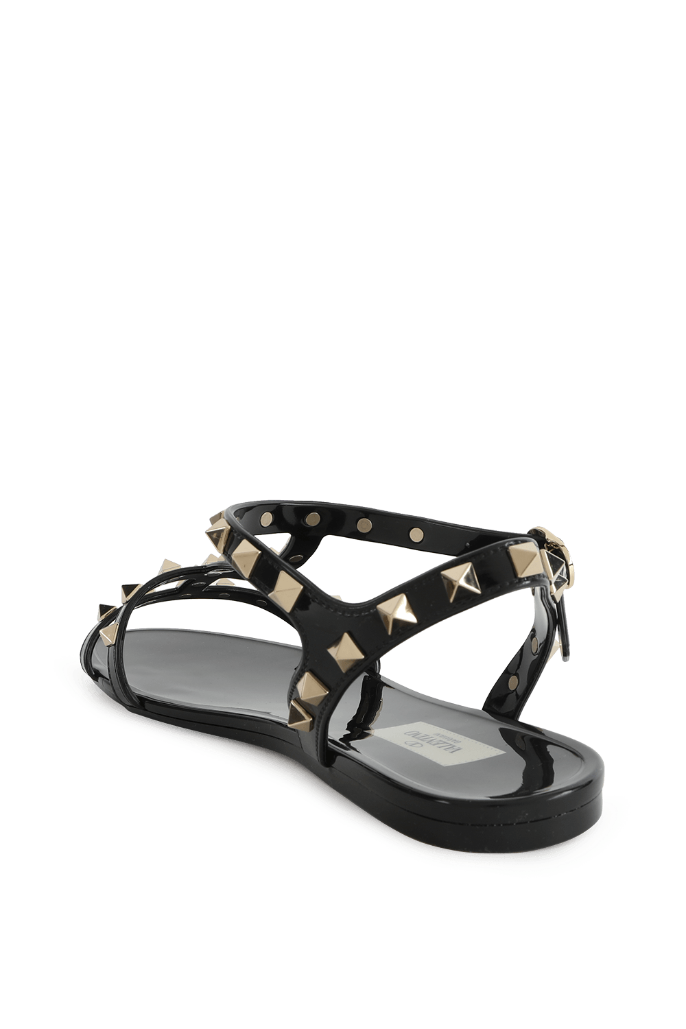 תמונה אחורית של סנדלי גומי שחורים עם רצועות ניטים