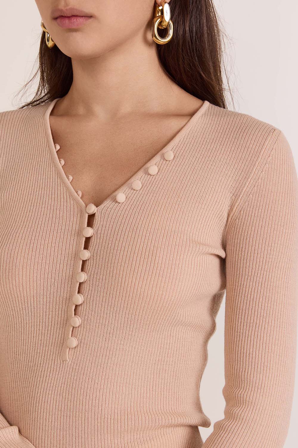 תמונת תקריב דוגמן של קרדיגן