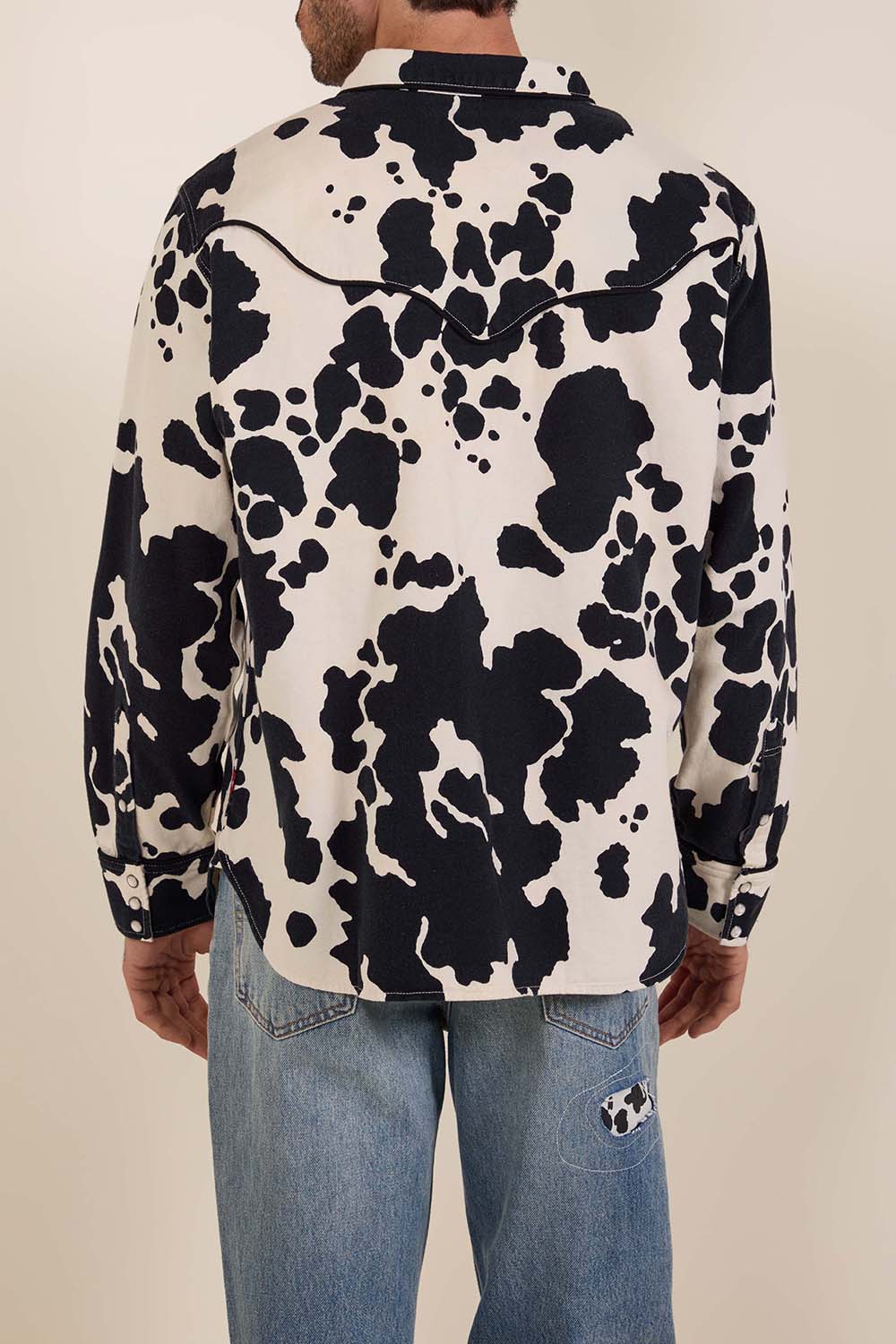 תמונת דוגמן אחורית של ליוויס X צעצוע של סיפור חולצת רודיאו