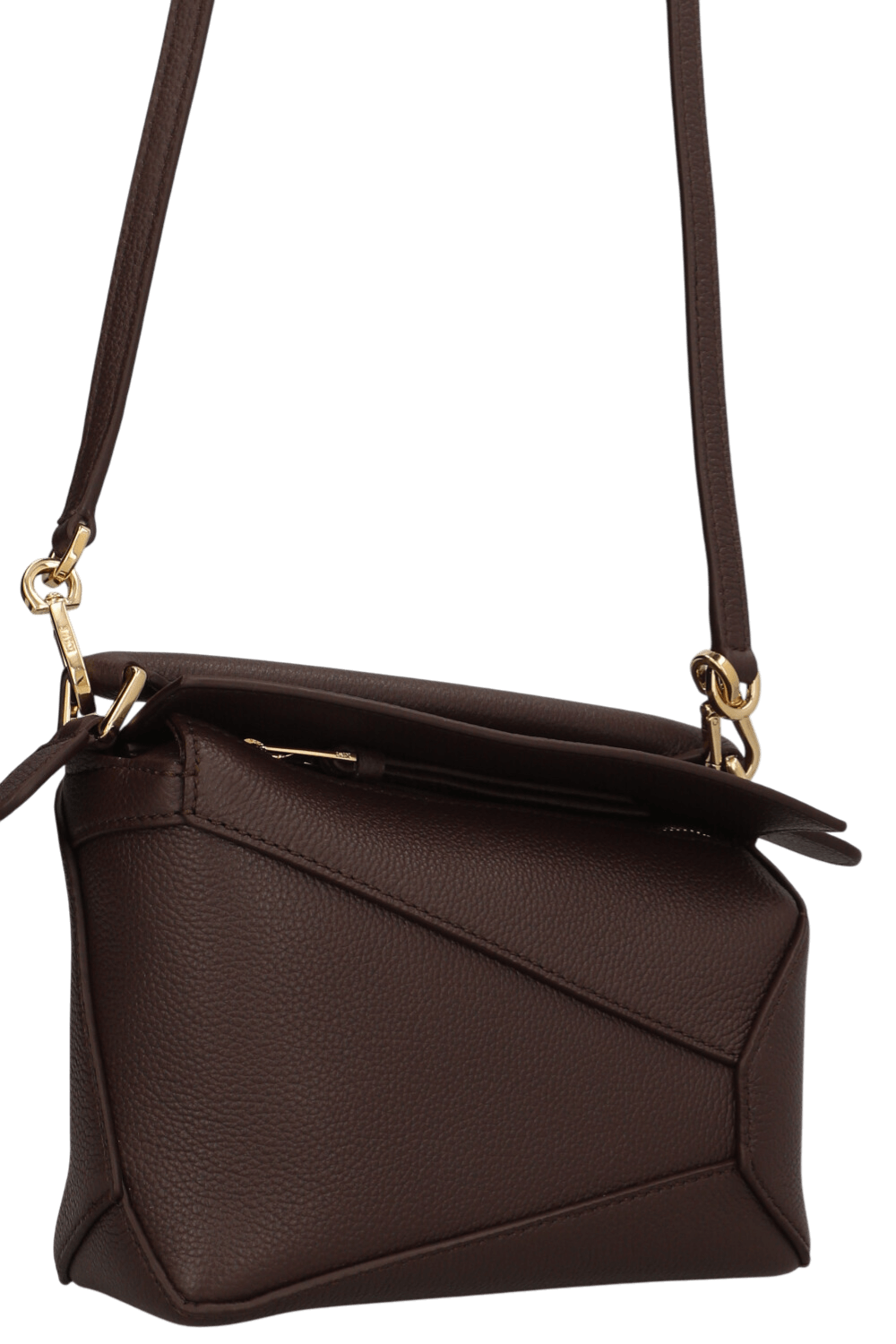 תמונת תקריב של תיק קרוסבודי פאזל אדג' מיני