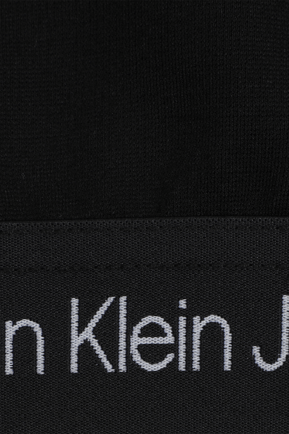 תמונה אחורית של חולצת קרופ עם לוגוטייפ - גילאי 4-16