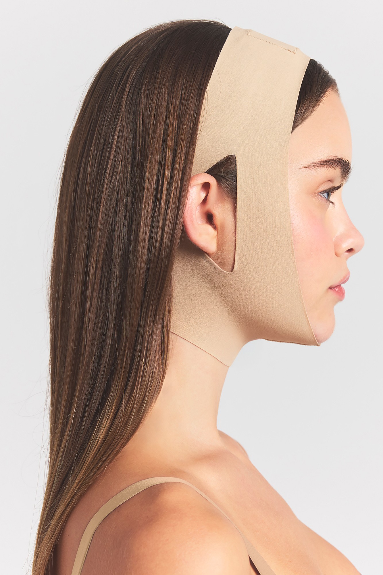 תמונת דוגמן אחורית של FACE SHAPER