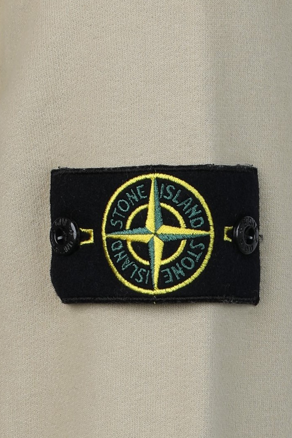 תמונה אחורית של סווטשירט עם קפוצ'ון בגוון בז'