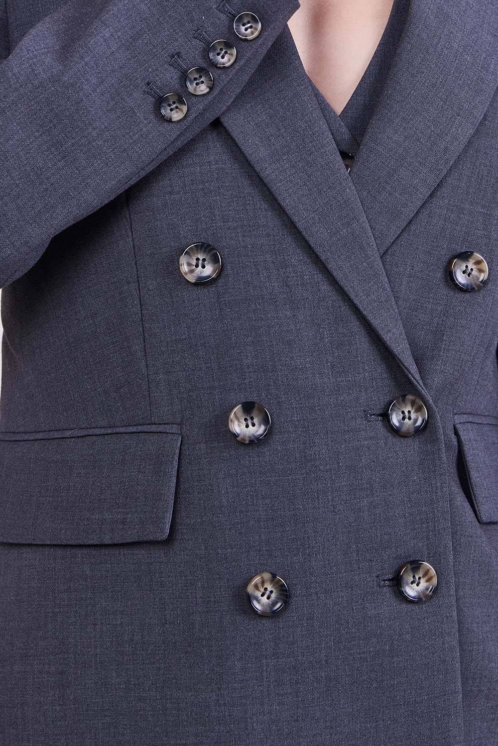 תמונת תקריב דוגמן של ז&rsquo;קט מחויט