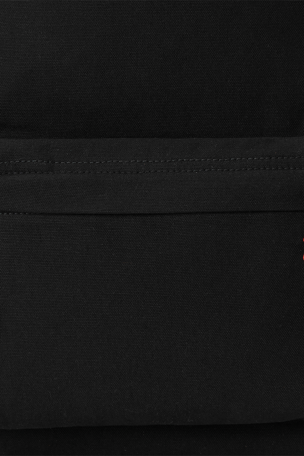 תמונת תקריב של תיק גב מכותנה