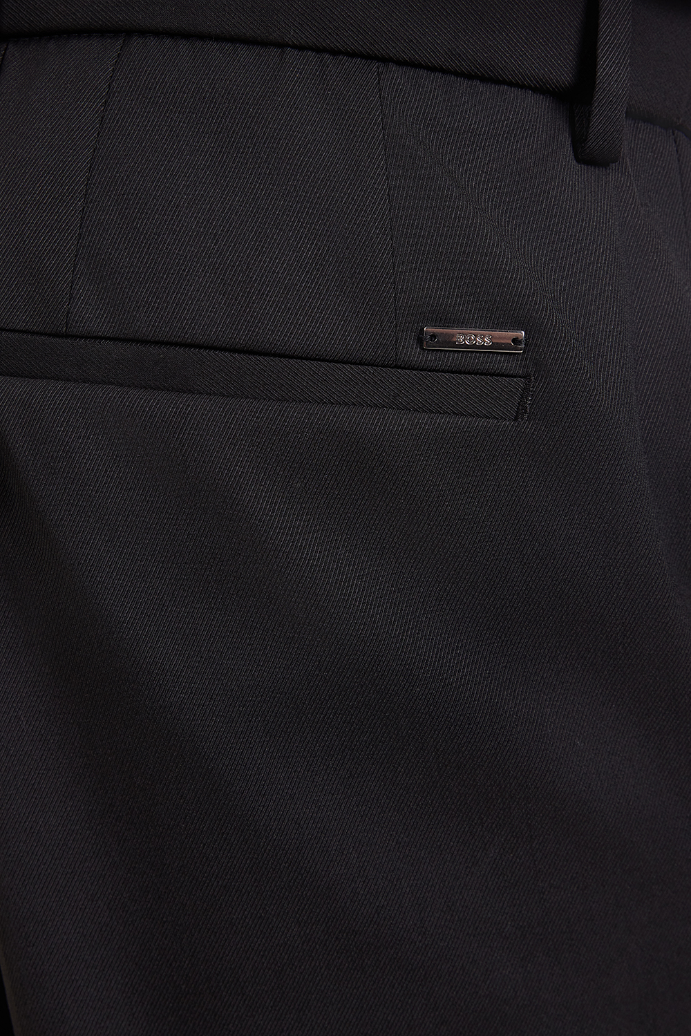 תמונת תקריב דוגמן של מכנסיים מחוייטים סלים פיט