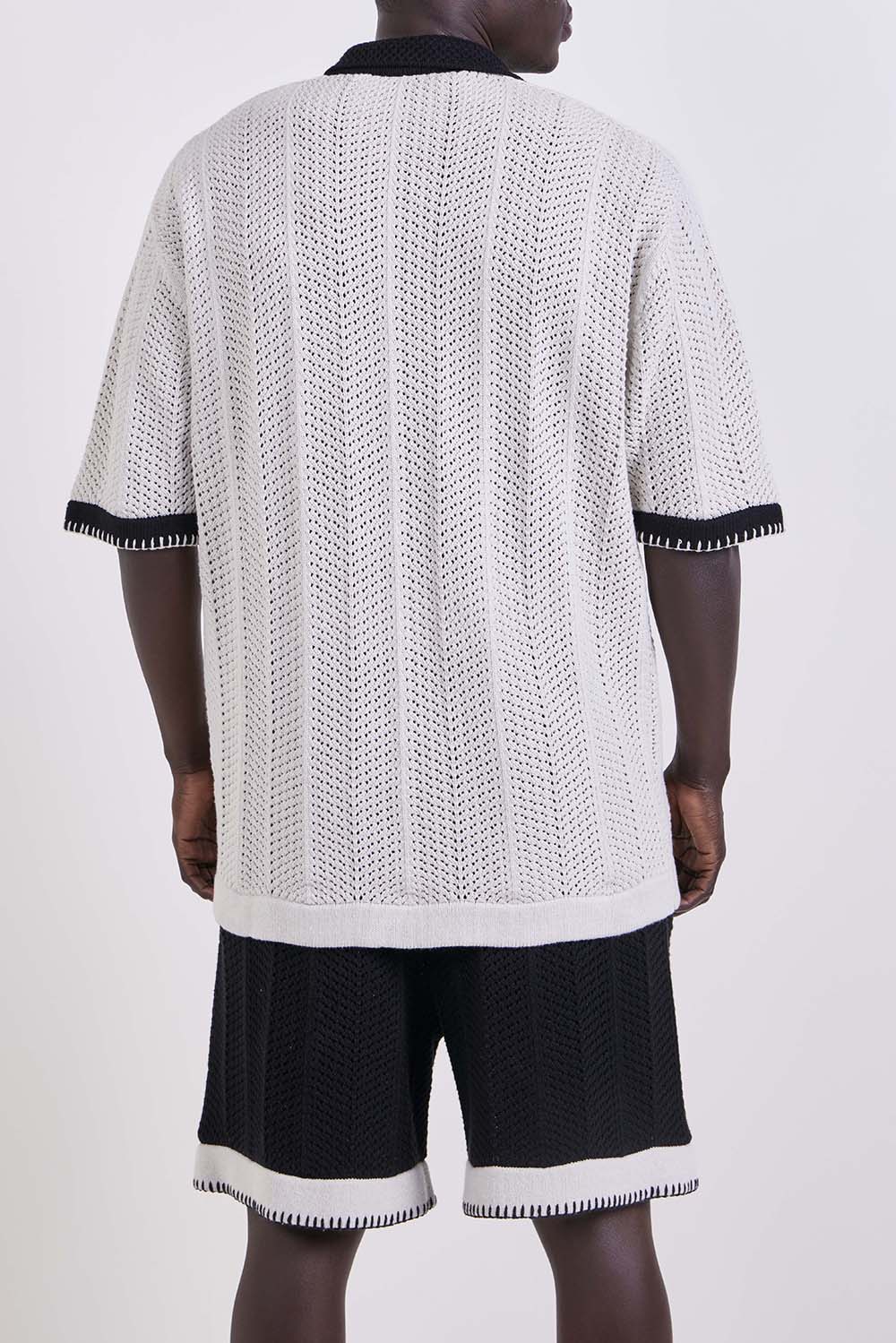 תמונת דוגמן אחורית של סריג פולו אוברסייז