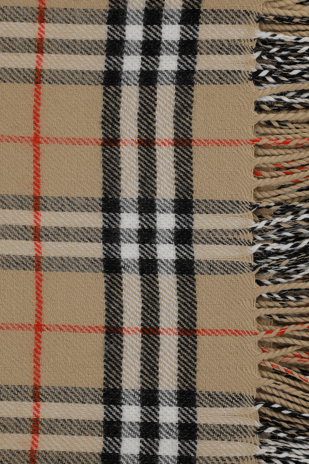 תמונת תקריב של שמיכת תינוקות במשבצות אייקוניות מצמר מרינו