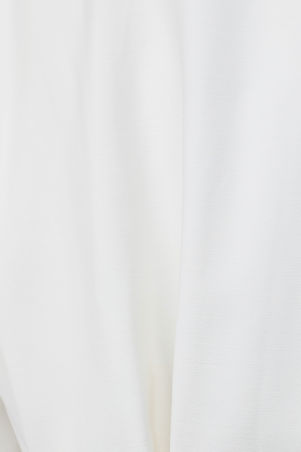 תמונת פנים של בלייזר אוברסייז לבן