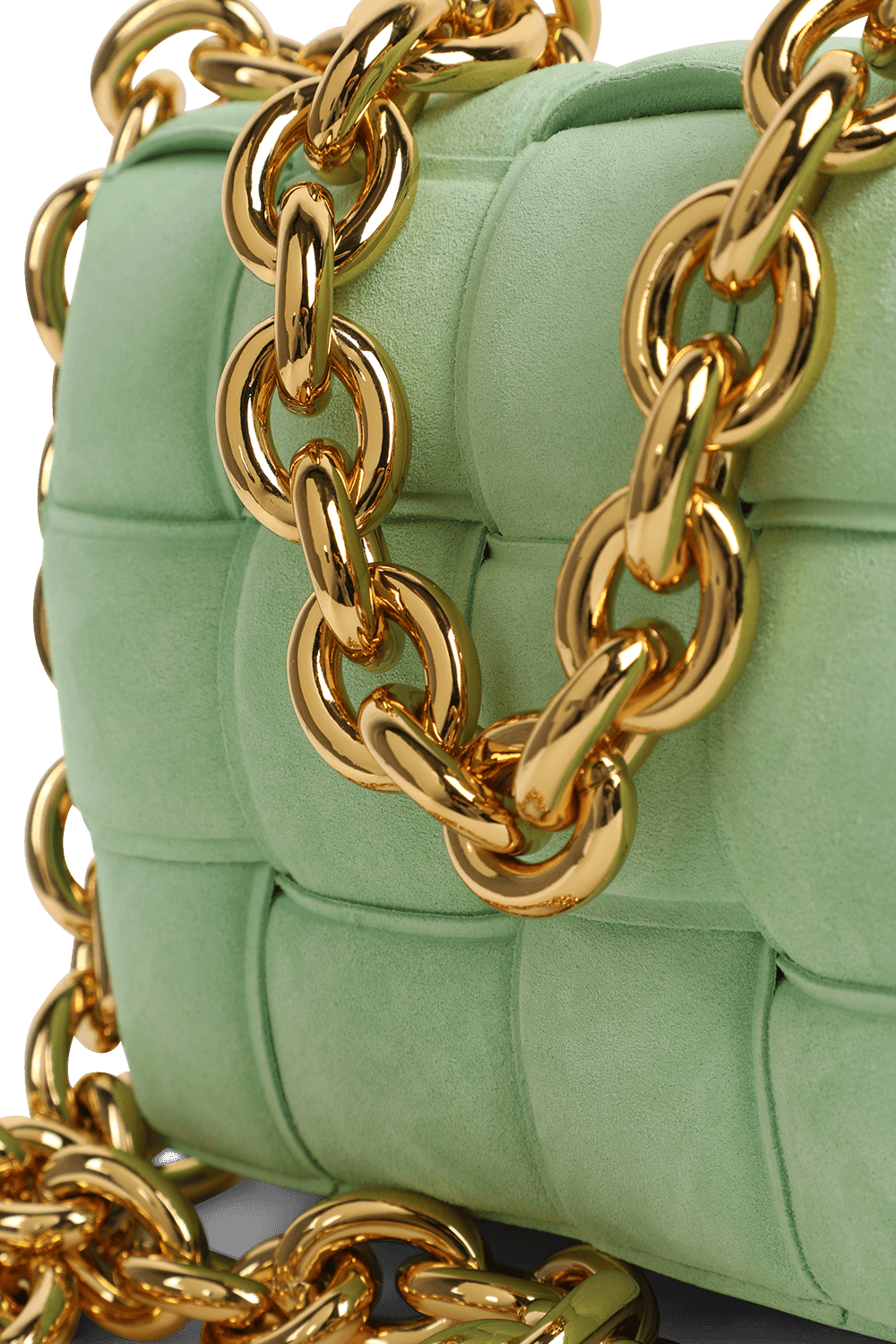 תמונת תקריב של תיק קסטה מקשמיר בגוון ירוק מנטה עם שרשרת זהובה