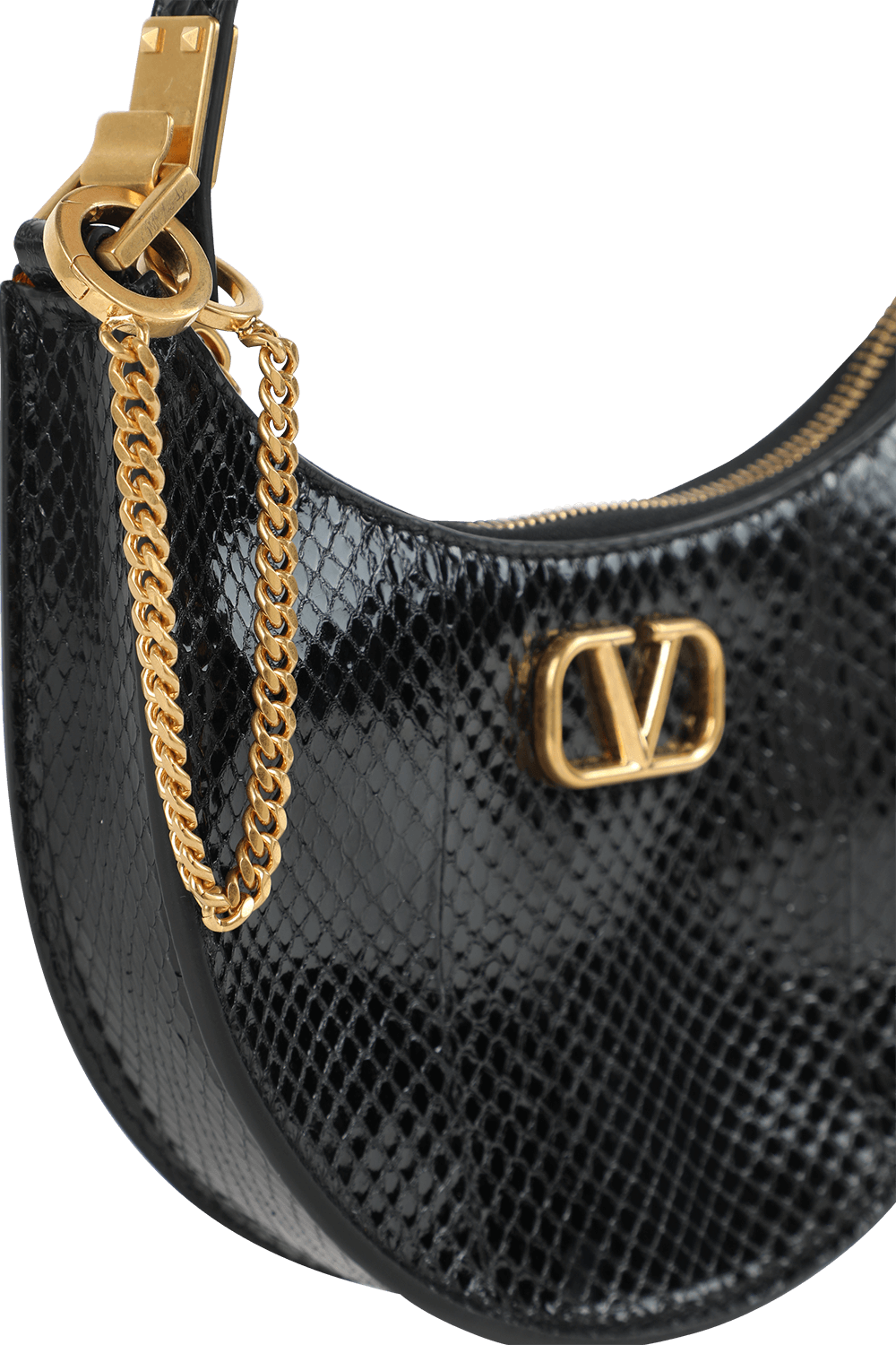 תמונת פנים של תיק שחור מבריק בצללית ירח