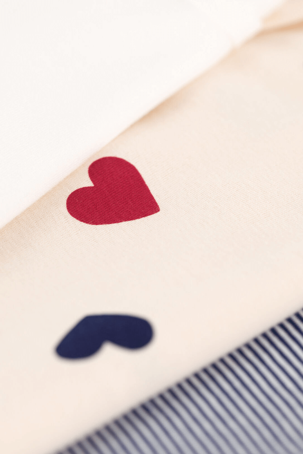 תמונה אחורית של שלושה זוגות בגדי גוף - גילאי 3-36 חודשים