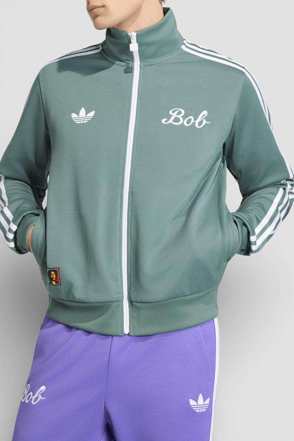 תמונת דוגמן קידמית של ז'קט בוב מארלי X אדידס