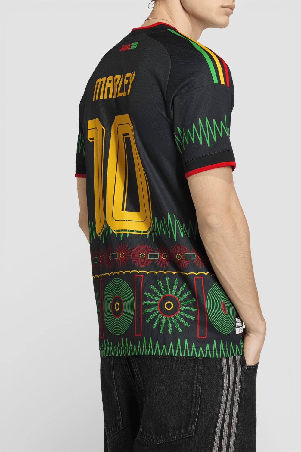 תמונת דוגמן אחורית של חולצת פולו כדורגל בוב מארלי X אדידס