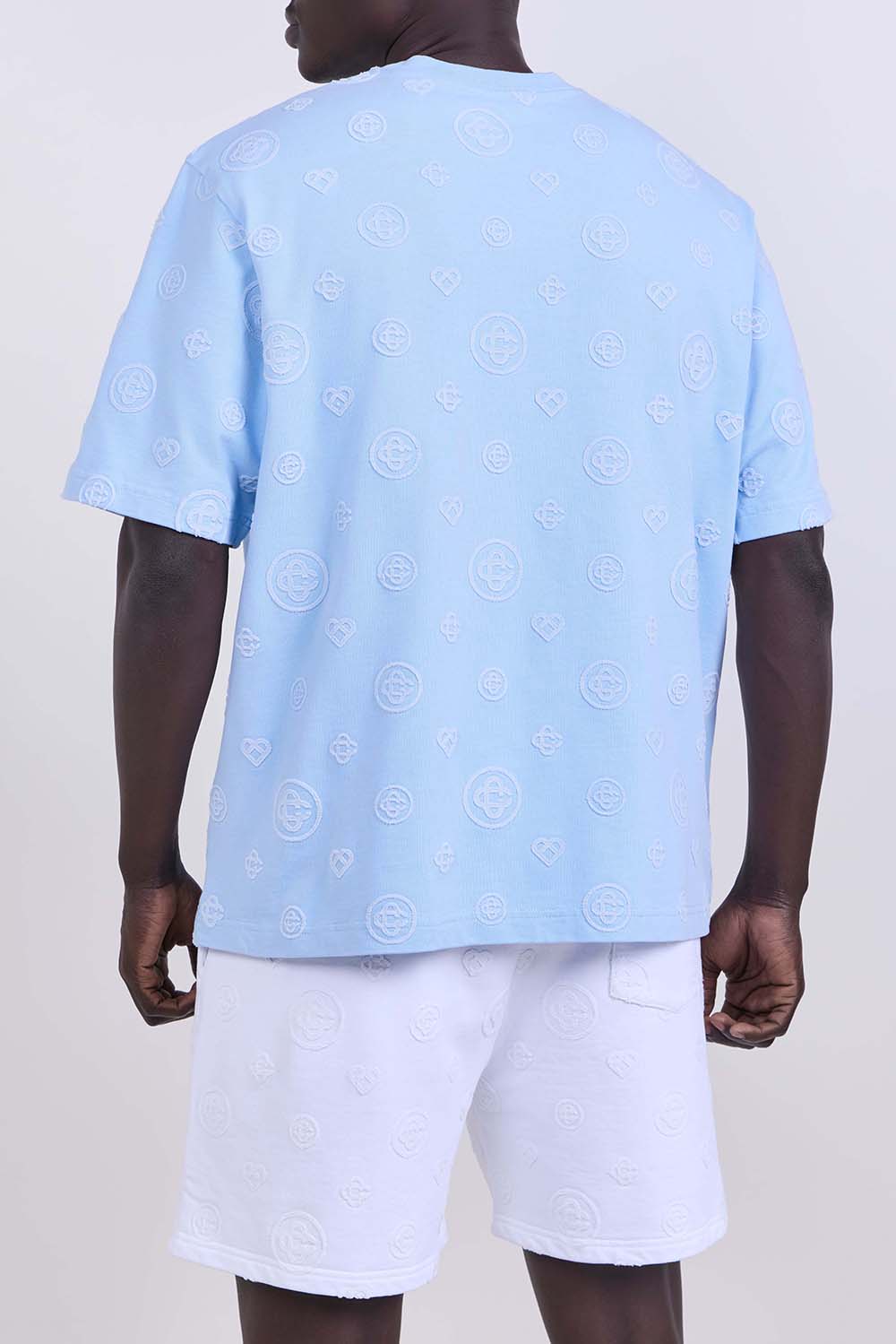 תמונת דוגמן אחורית של חולצת טי בגזרת אוברסייז