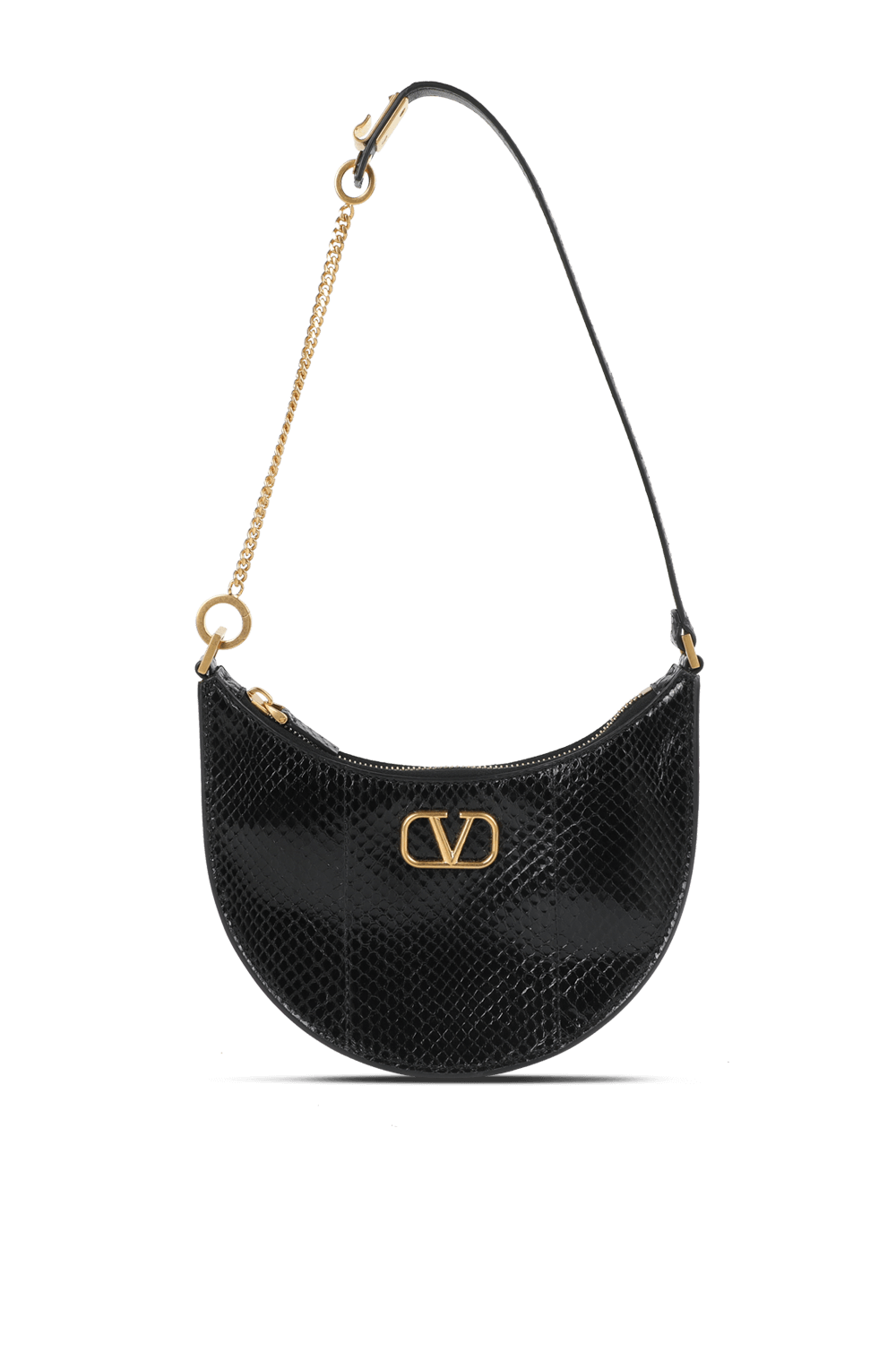 תמונה אחורית של תיק שחור מבריק בצללית ירח