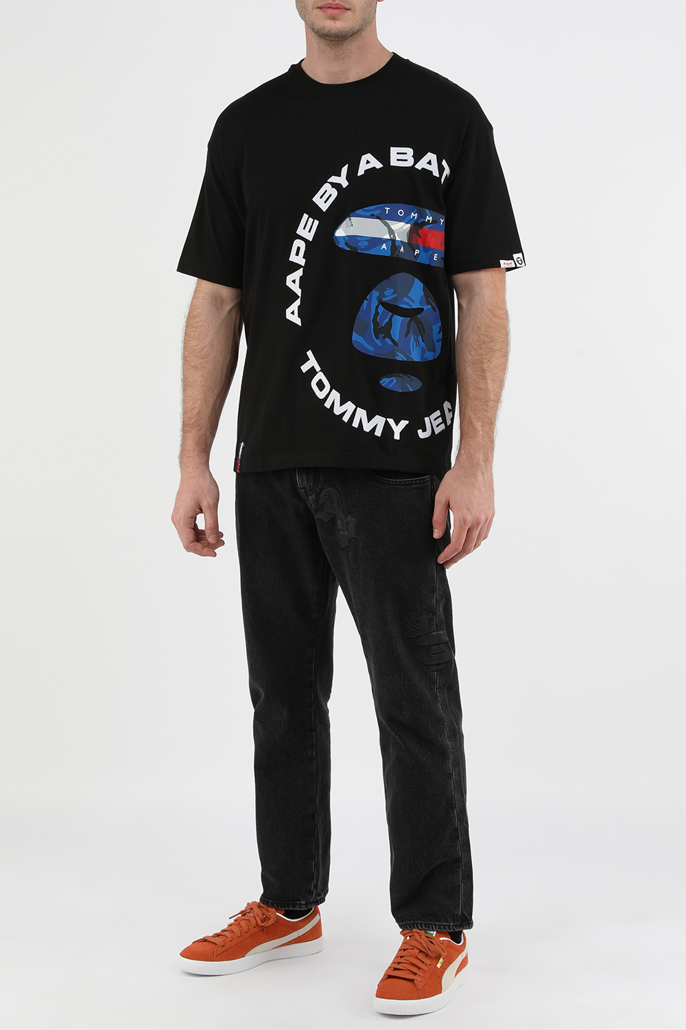 תמונת דוגמן קידמית של נעלי סניקרס זמש בצבע כתום