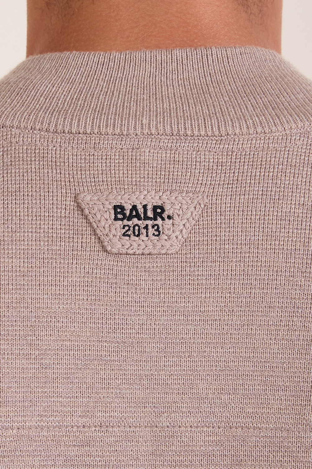 תמונת תקריב דוגמן של קרדיגן