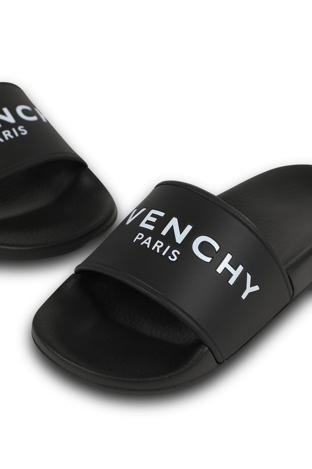 תמונת תקריב של מידות 28-33 סנדלי סליידס ממותגים בשחור ולבן