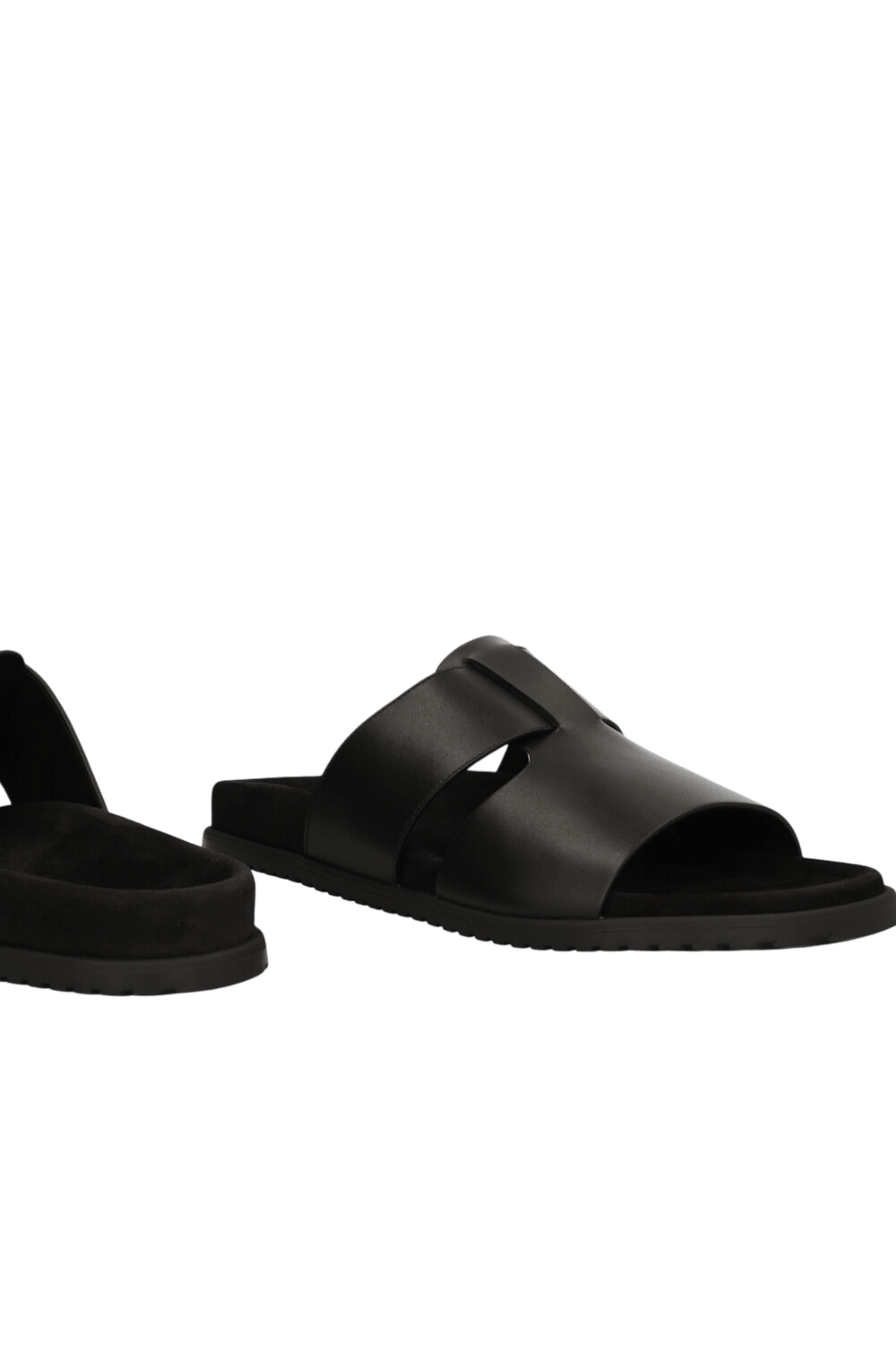 תמונת תקריב של כפכפי סלייד עור