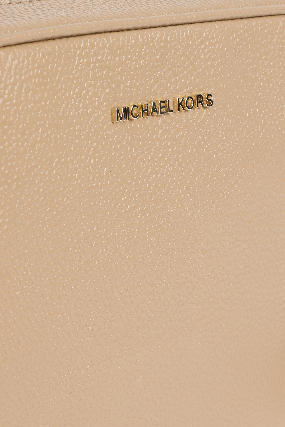 תמונת תקריב של תיק קאמרה בצבע קאמל