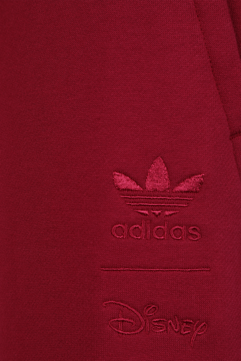 תמונה אחורית של אדידס X דיסני מכנסי טרנינג פוקסיה עם במבי רקום