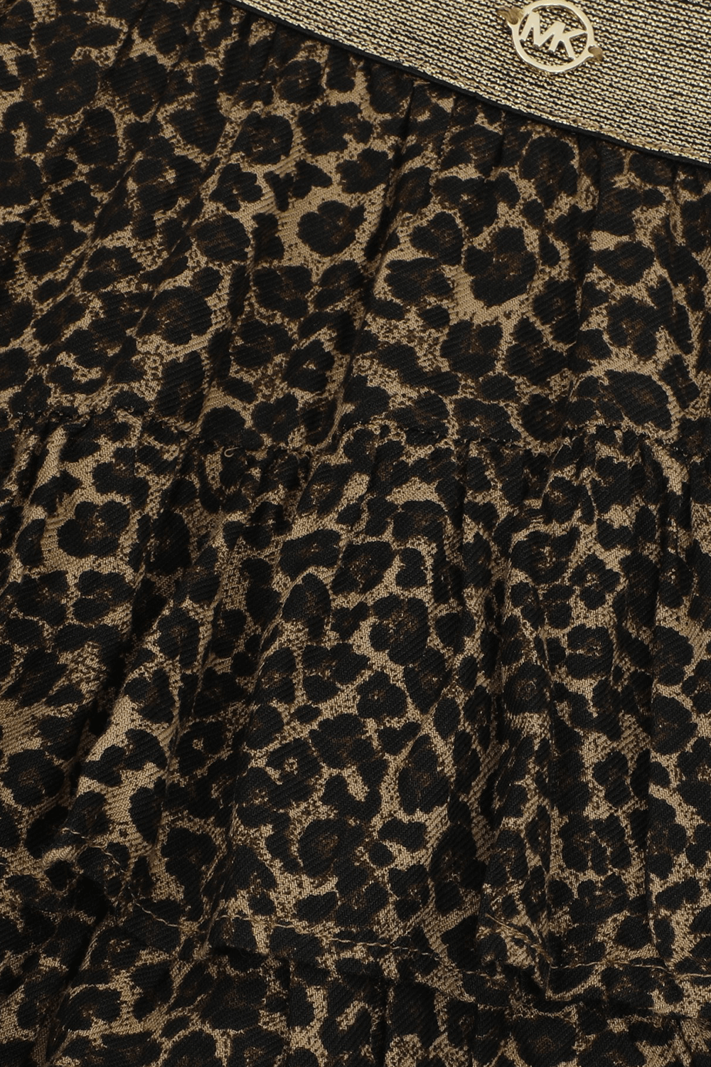 תמונה אחורית של גיל 14 חצאית מיני מנומרת