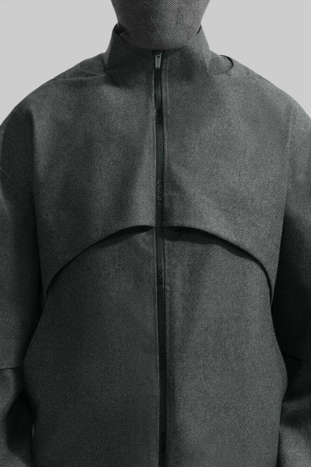 תמונת דוגמן קידמית של מעיל צמר נייקי X נוקטה